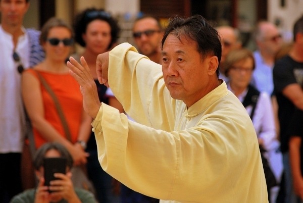 Image of man doing Tai Chi