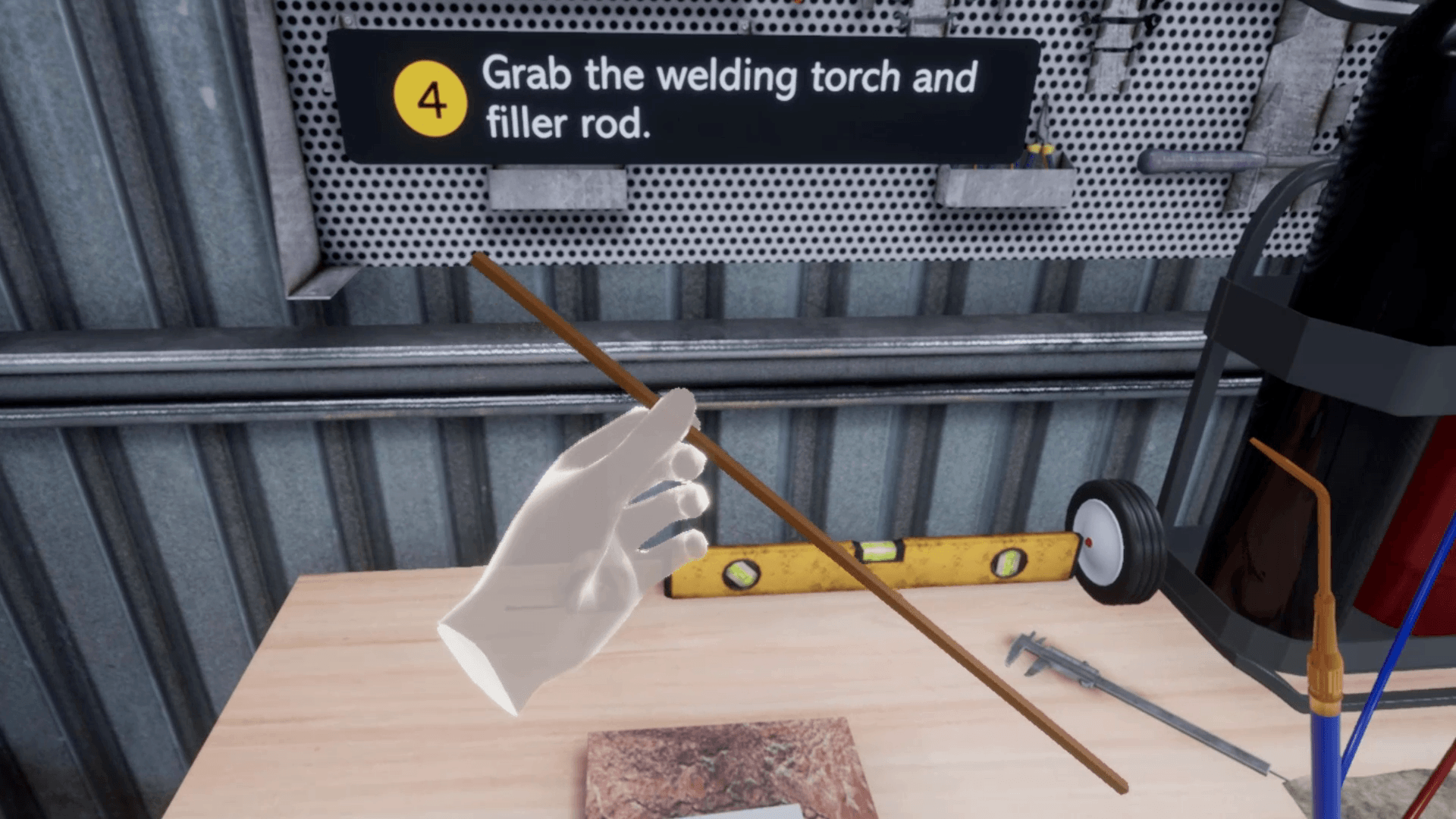 Practicing the welding process in a VR environment.